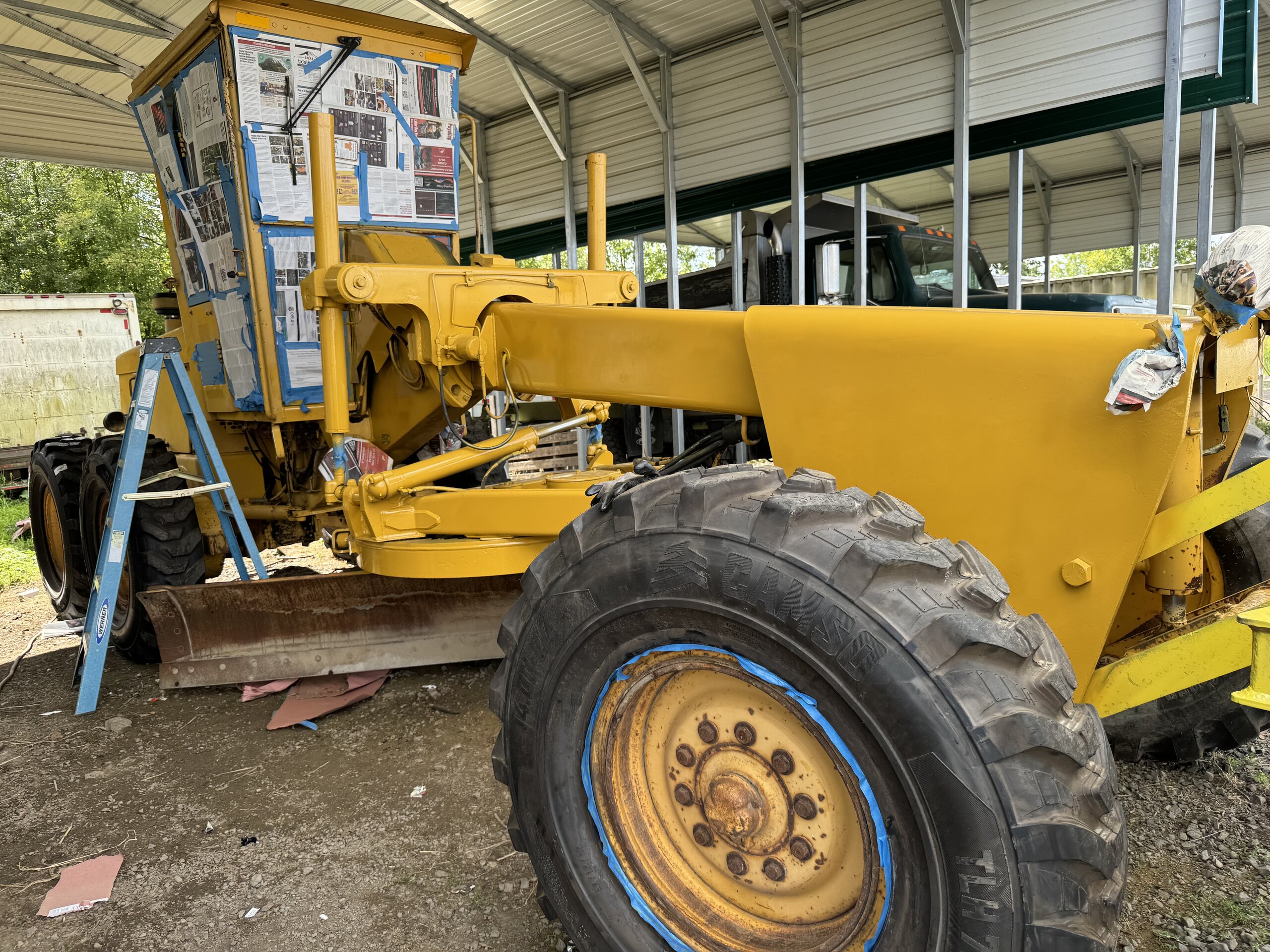 Painting a grader